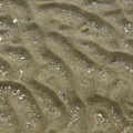 Wellenmuster im Sand